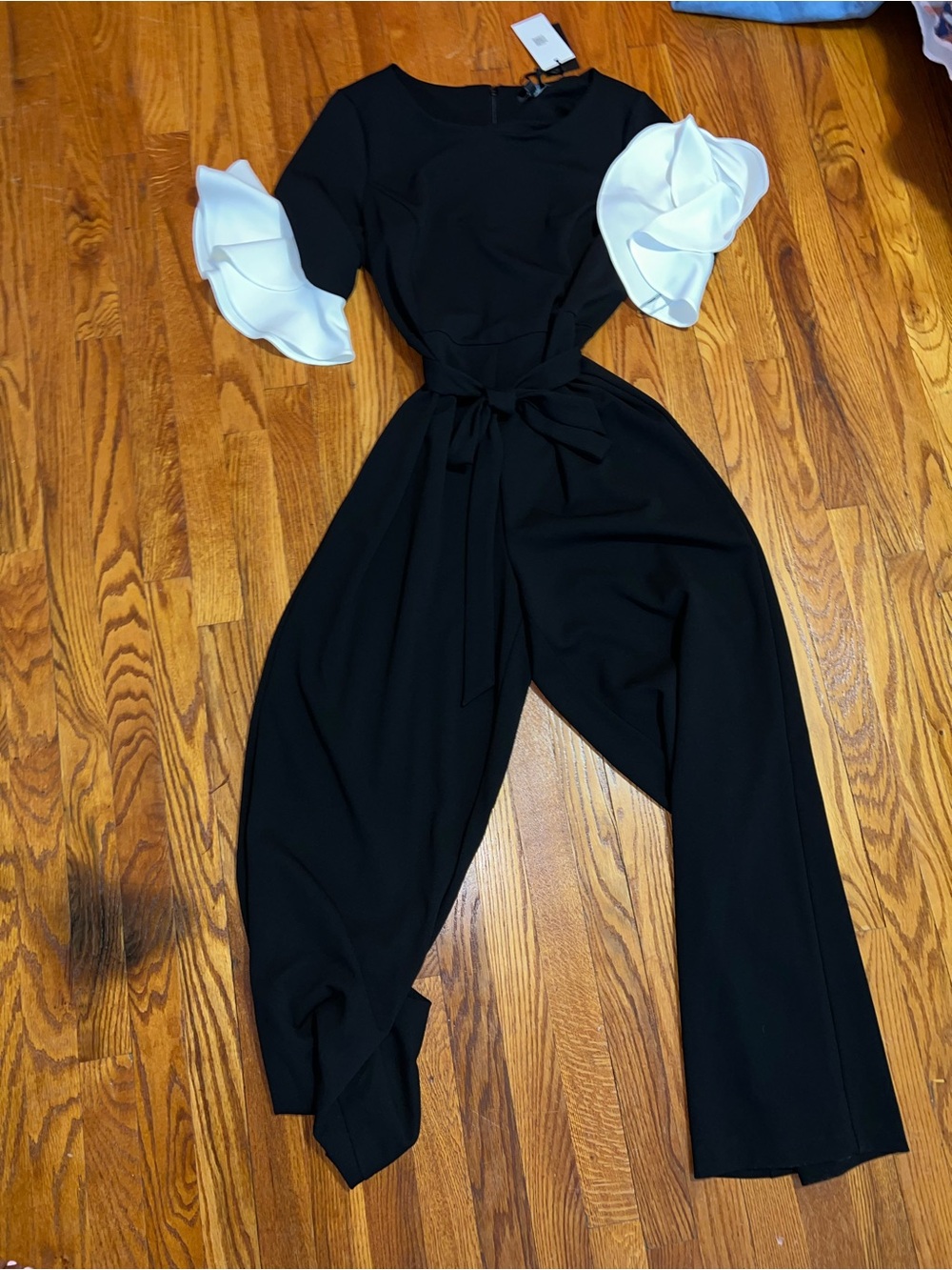 DKNY Black Jumpsuit with White Ruffle Sleeves